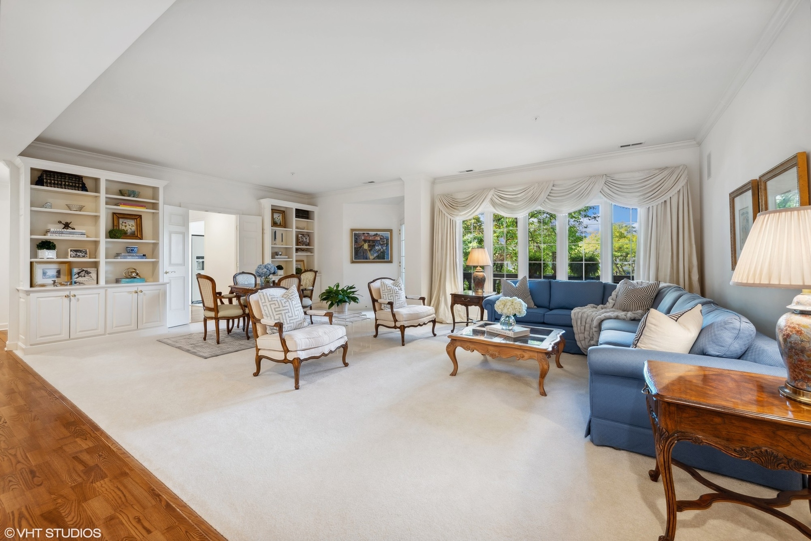 223 Regent Wood Road Northfield, IL 60093 - Photo 6 of 21 a living room with furniture and a large window