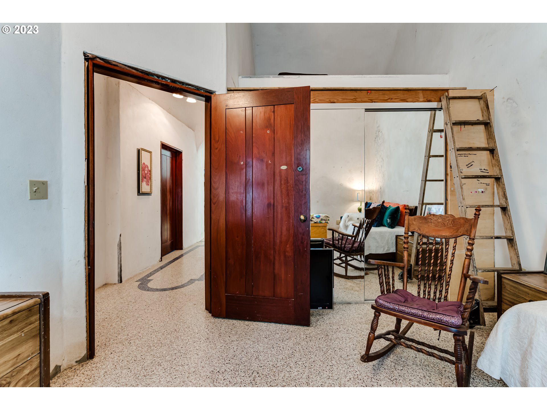 28375 Rainbow Valley Road Eugene, OR 97402 - Photo 10 of 21 a balcony with furniture and a gate
