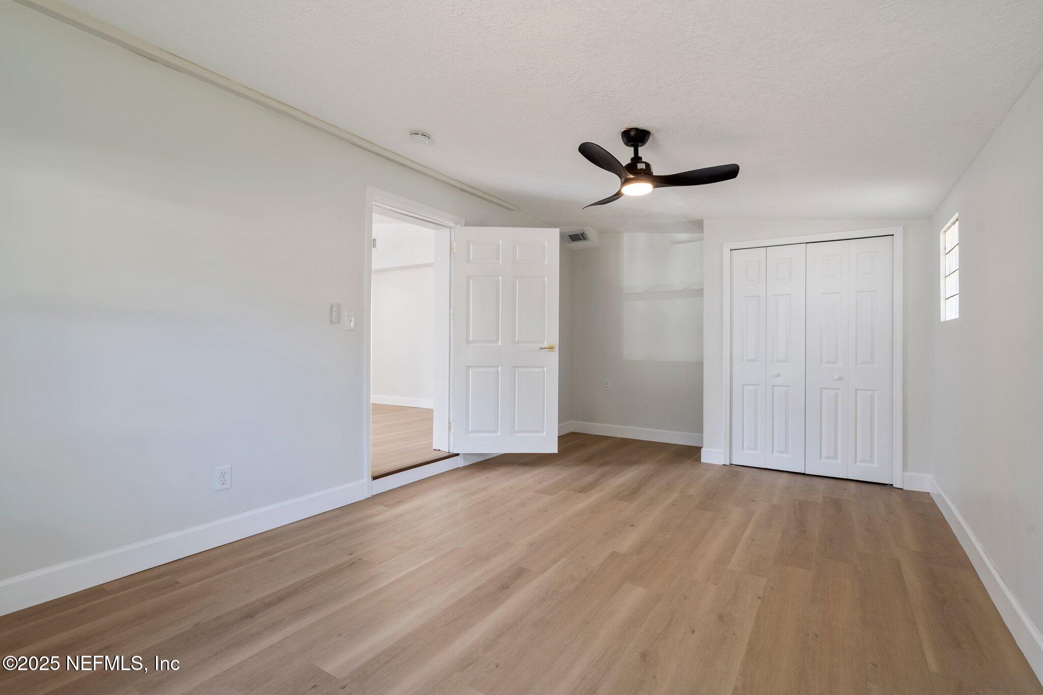 7420 Sandhurst Road South Jacksonville, FL 32277 - Photo 9 of 35 wooden floor in an empty room