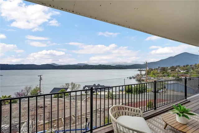 a aerial view of a house with a yard