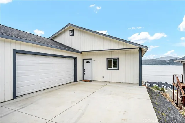 a view of balcony with couch and wooden floor