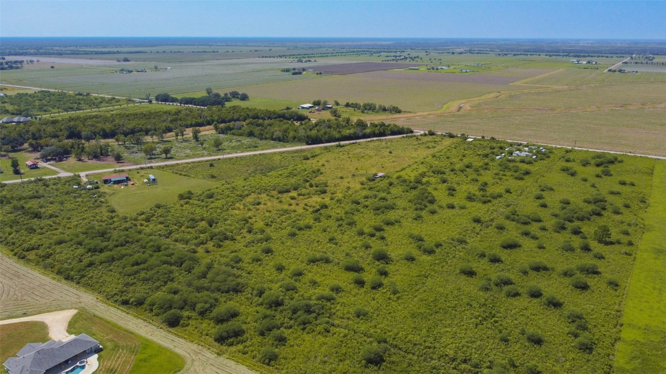 15415 Barak Road Guy, TX 77444 - Photo 2 of 10 The property offers wide-open views of surrounding farmland and countryside, providing a private and peaceful setting