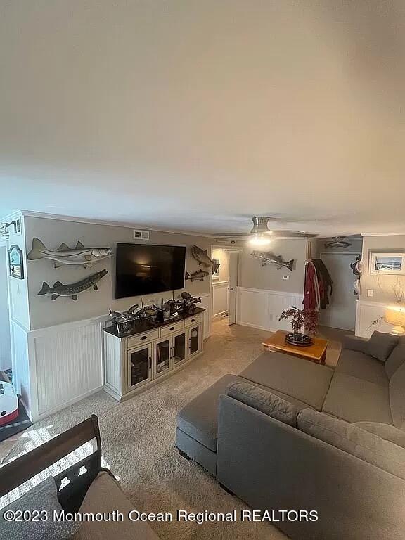 200 Portland Road, Unit C16 Highlands, NJ 07732 - Photo 3 of 10 a living room with furniture a flat screen tv and a rug