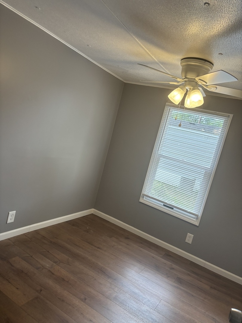 3 Franklin Drive Manteno, IL 60950 - Photo 15 of 23 a view of a small space with wooden floor and window