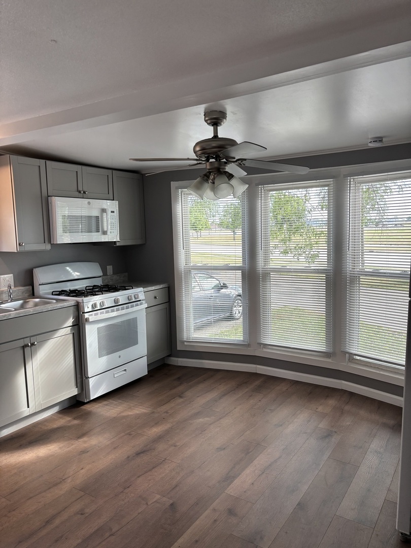 3 Franklin Drive Manteno, IL 60950 - Photo 3 of 23 a view of kitchen with stainless steel appliances cabinets and a large window