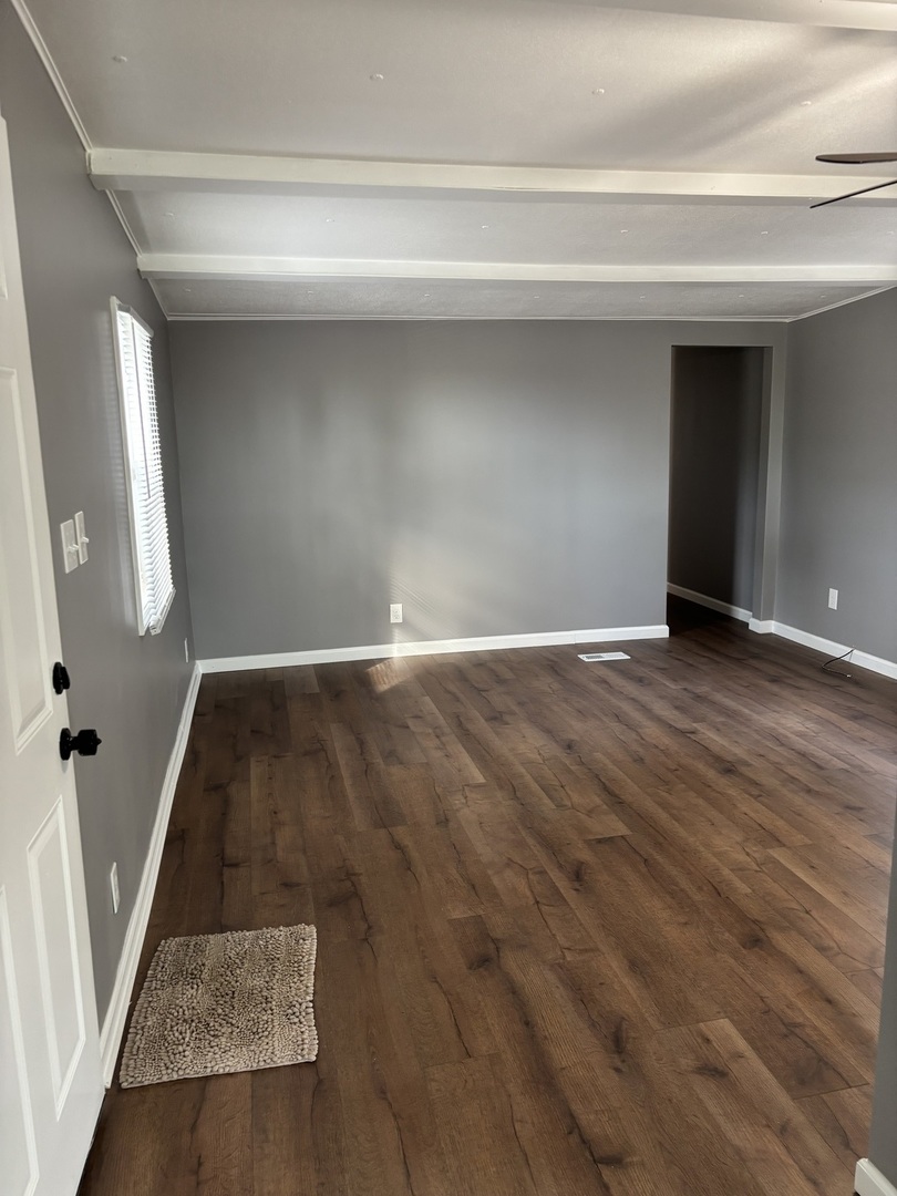 3 Franklin Drive Manteno, IL 60950 - Photo 10 of 23 a view of an empty room and wooden floor