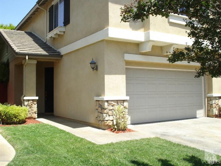 4543 Rivergate Court Riverside, CA 92505 - Photo 1 of 10 a front view of a house with a yard