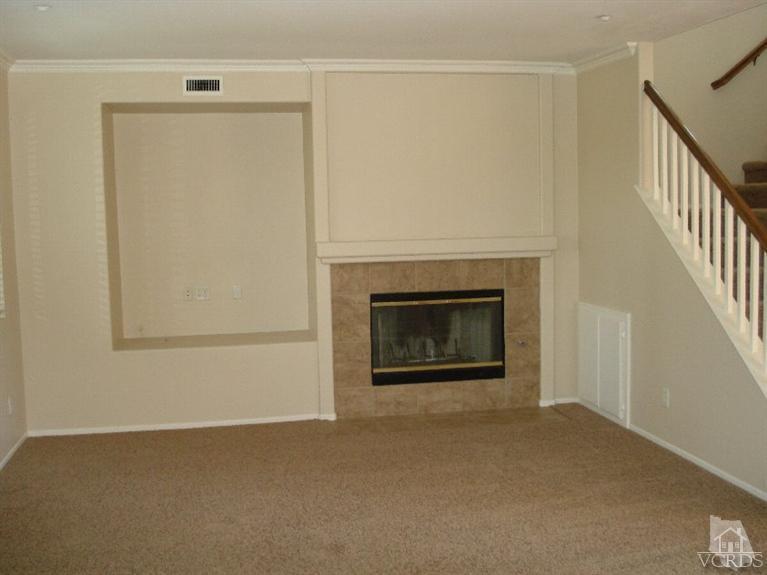 4543 Rivergate Court Riverside, CA 92505 - Photo 3 of 10 a view of an empty room with a fireplace