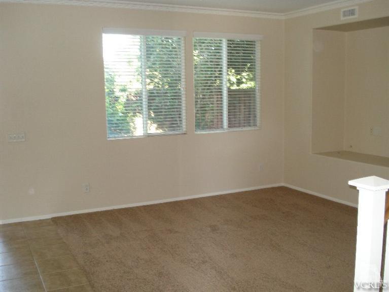 4543 Rivergate Court Riverside, CA 92505 - Photo 4 of 10 a view of an empty room with a window