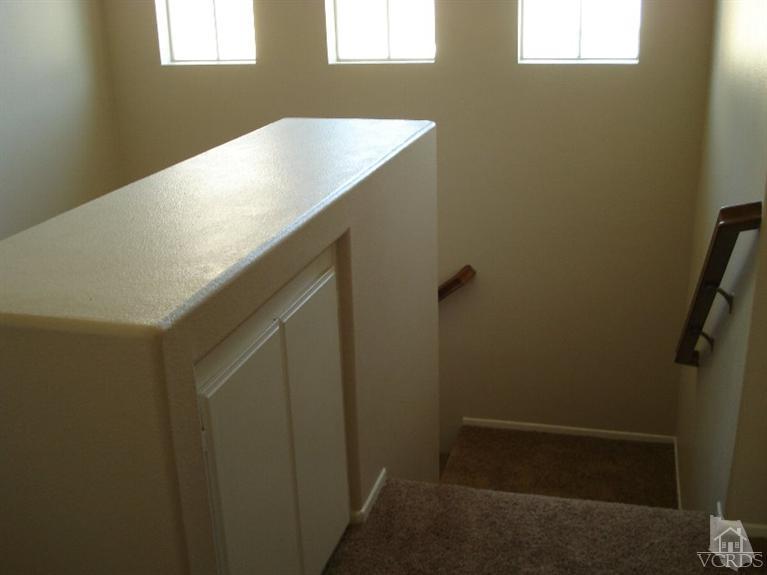 4543 Rivergate Court Riverside, CA 92505 - Photo 8 of 10 a bathroom with a sink and shower