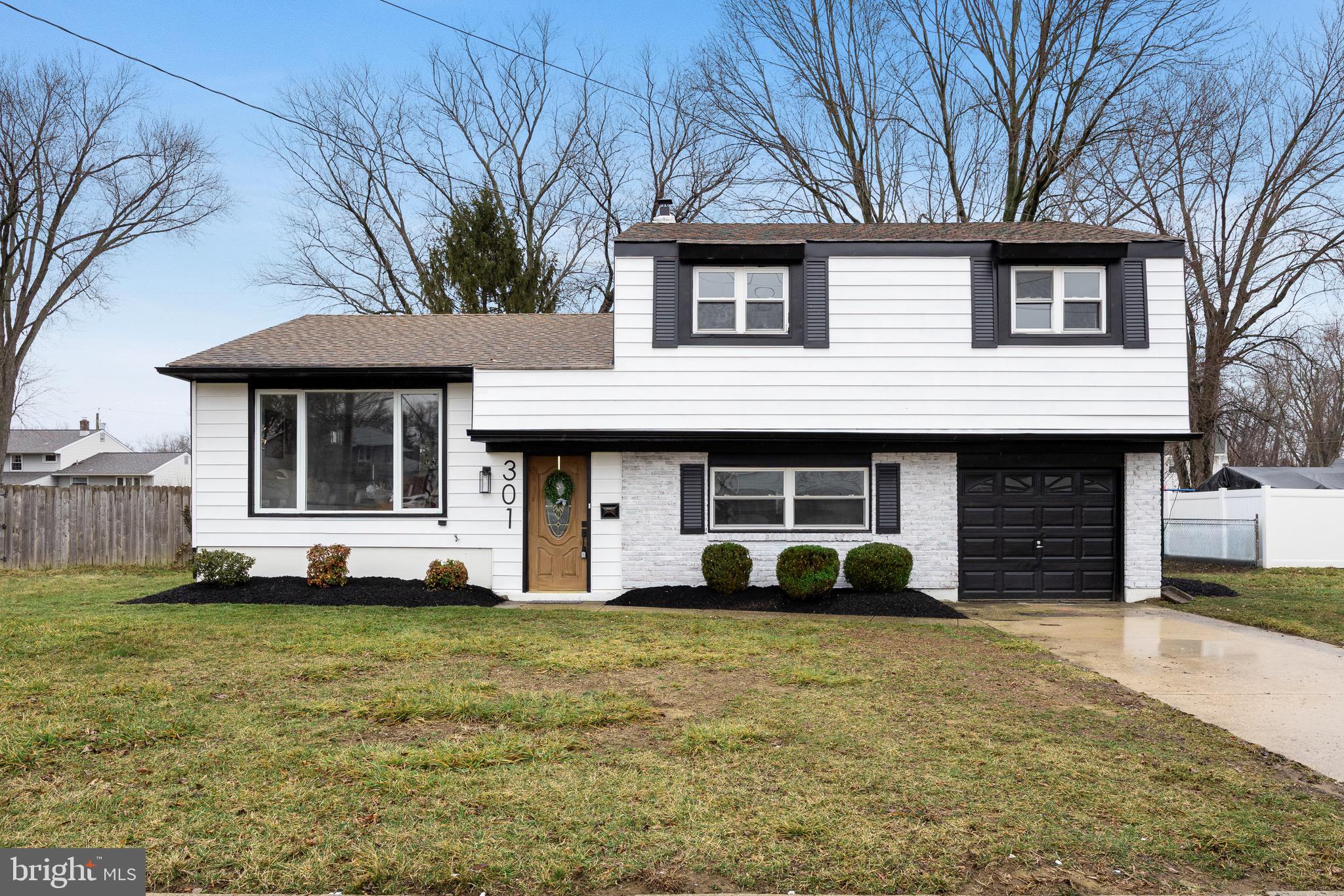 301 Cardinal Road Beverly, NJ 08010 - Photo 1 of 27 a view of a front of house with a yard
