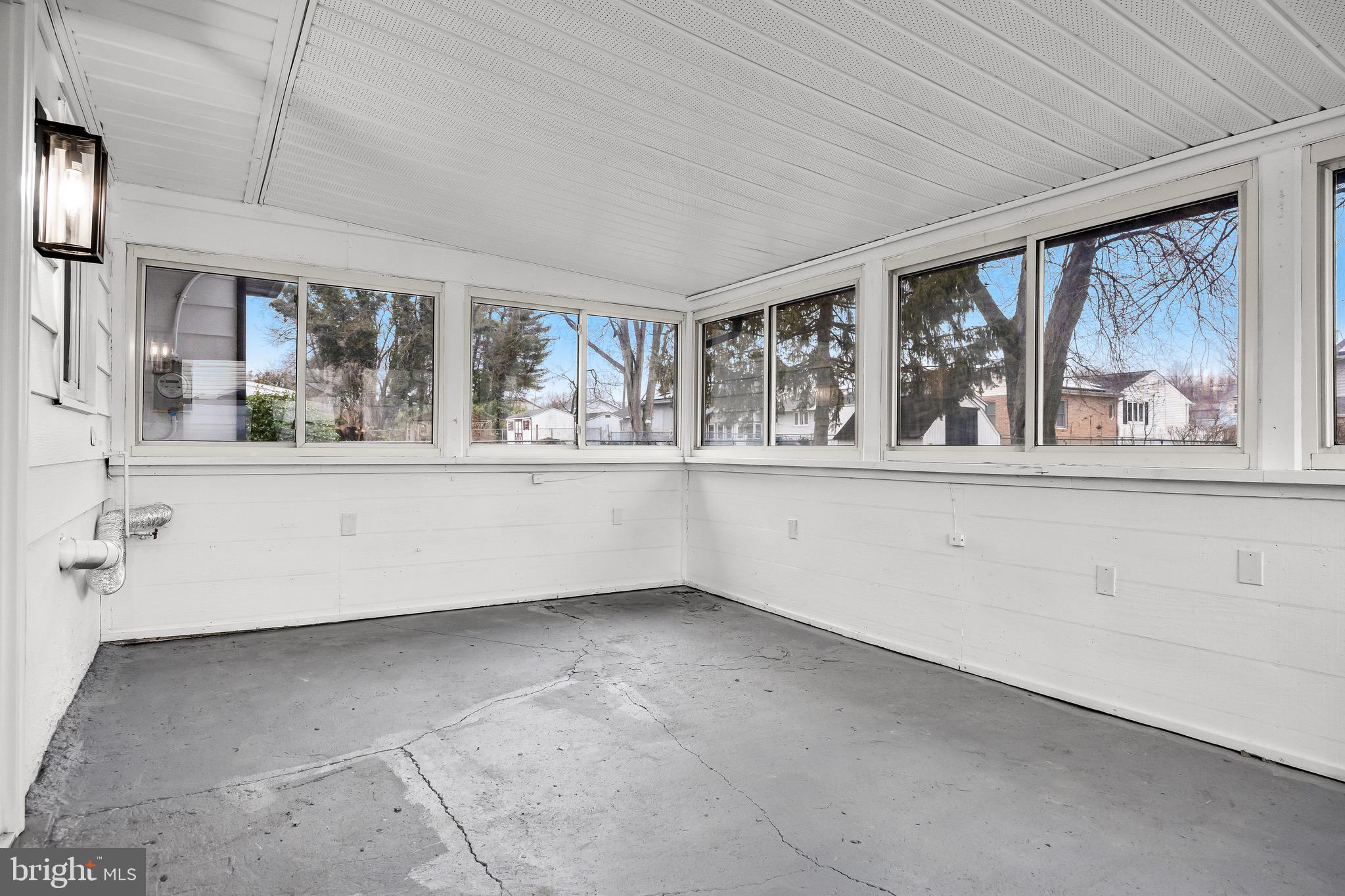 301 Cardinal Road Beverly, NJ 08010 - Photo 24 of 27 a view of an empty room with a window