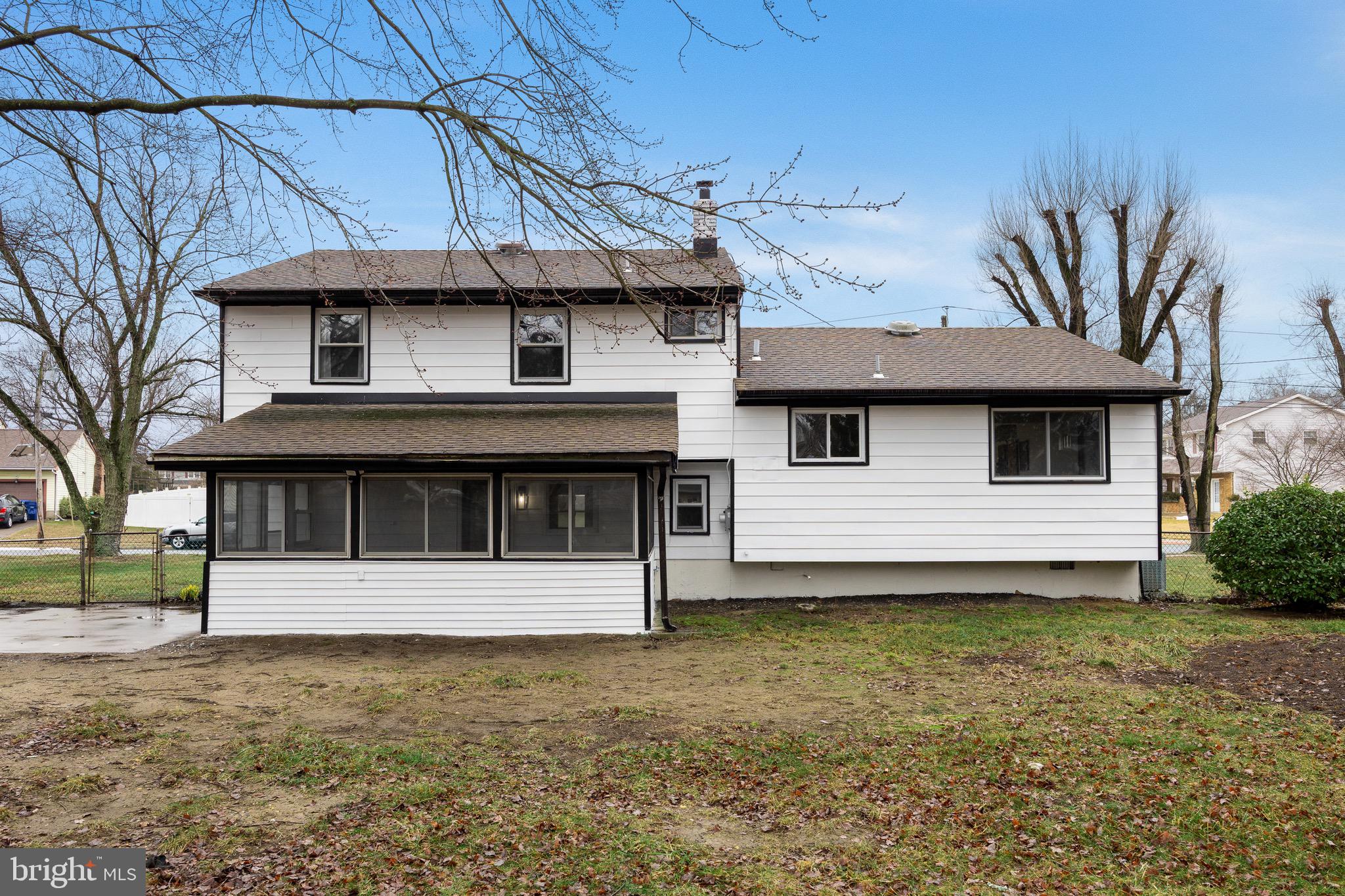 301 Cardinal Road Beverly, NJ 08010 - Photo 26 of 27 a view of a house with a garden