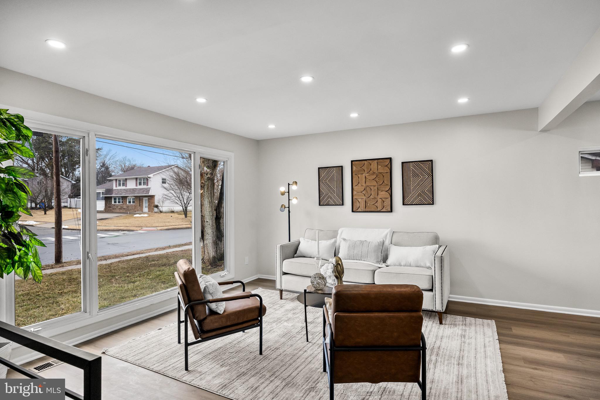 301 Cardinal Road Beverly, NJ 08010 - Photo 6 of 27 a living room with furniture and a large window