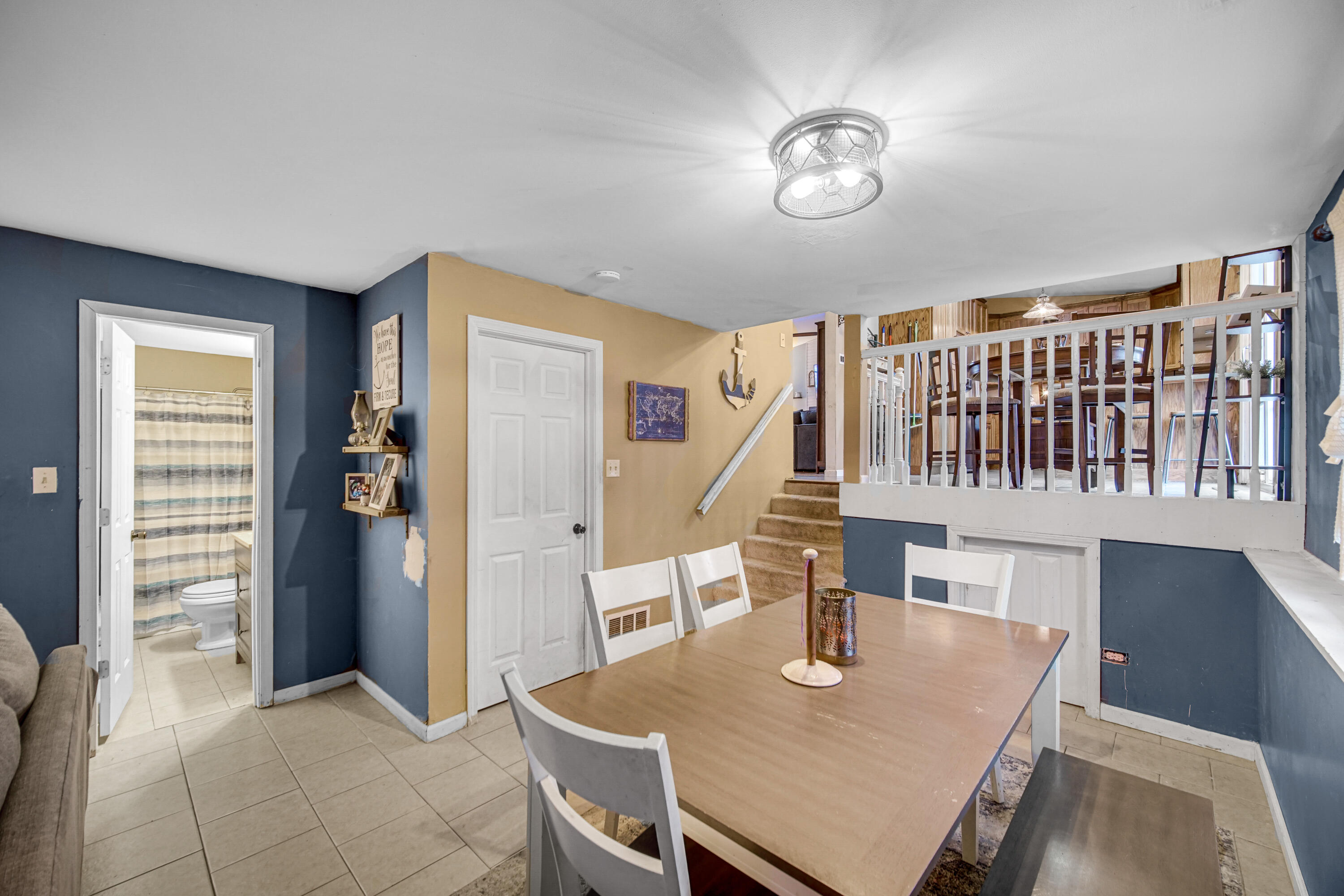 4038 Kingsway Drive Crown Point, IN 46307 - Photo 9 of 18 a view of a dining room with furniture and a window