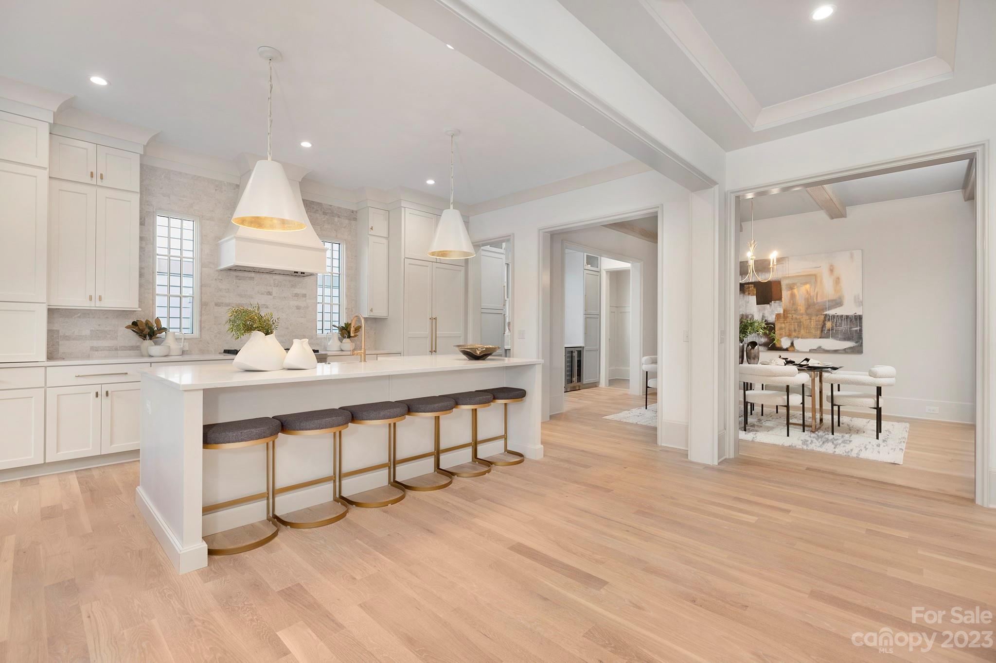 1213 Reece Road Charlotte, NC 28209 - Photo 11 of 31 a large white kitchen with a large window