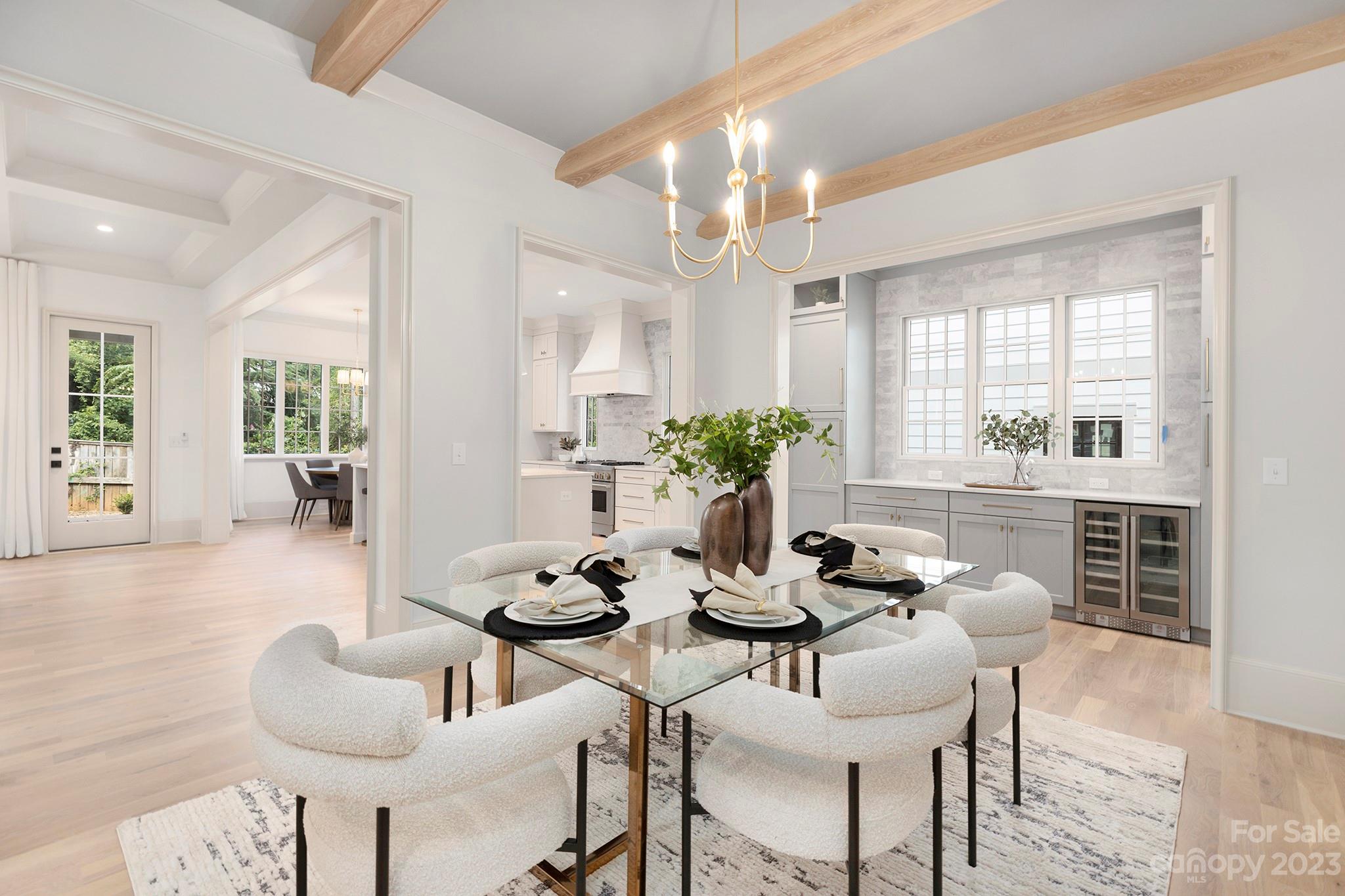 1213 Reece Road Charlotte, NC 28209 - Photo 18 of 31 a dining room with furniture and wooden floor