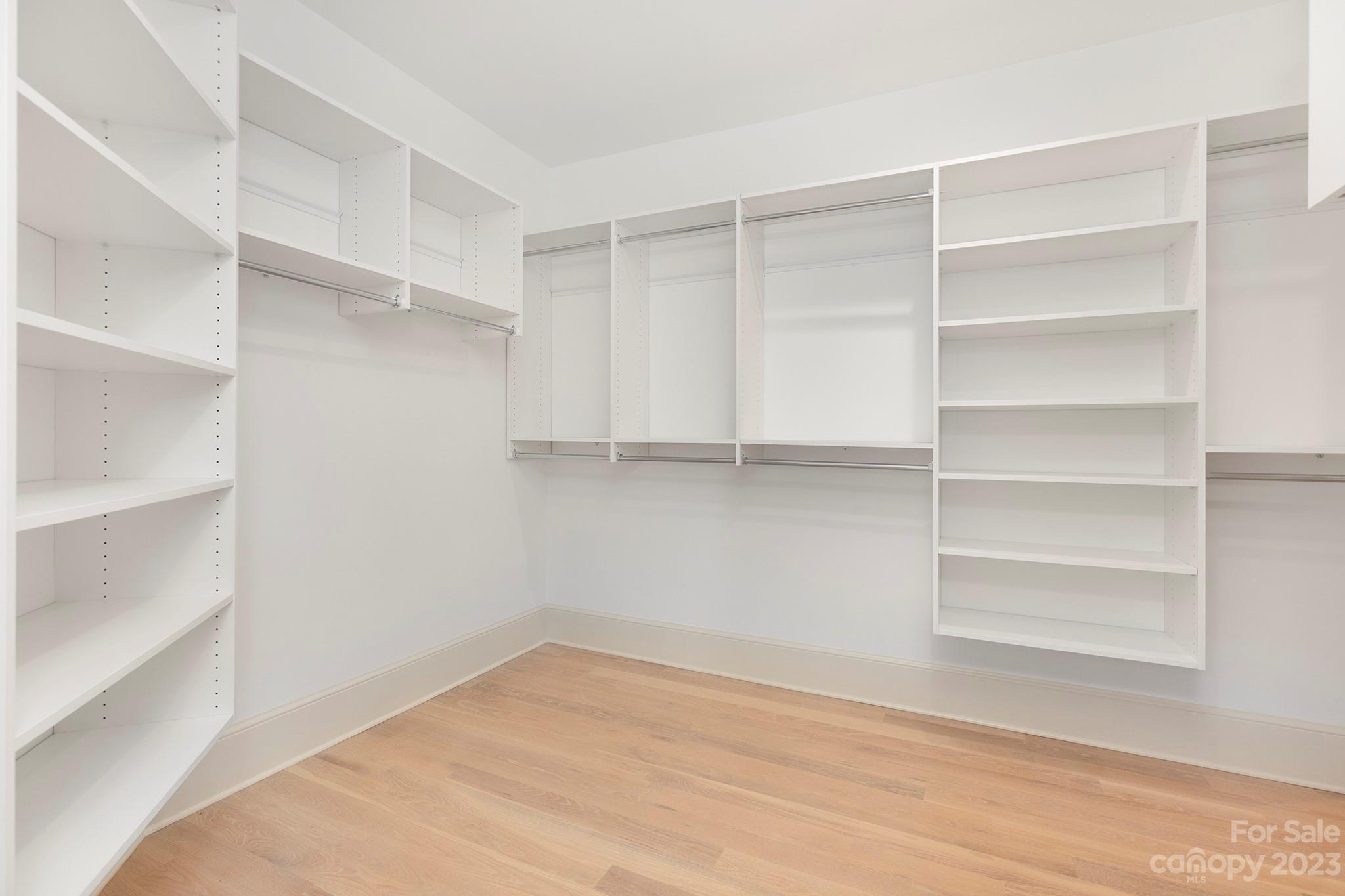 1213 Reece Road Charlotte, NC 28209 - Photo 22 of 31 a view of an empty walk in closet