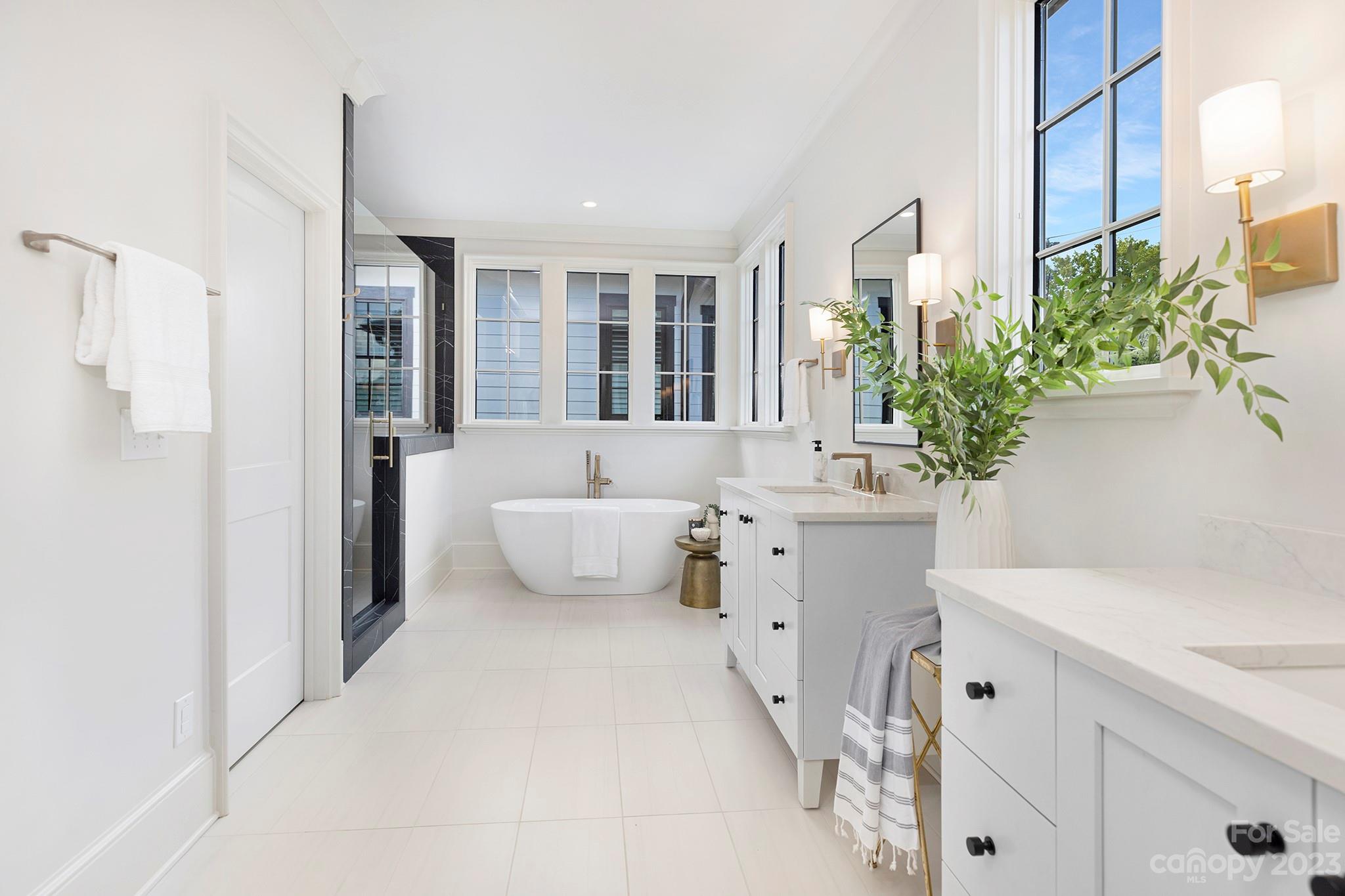 1213 Reece Road Charlotte, NC 28209 - Photo 23 of 31 a bathroom with a sink and a bathtub