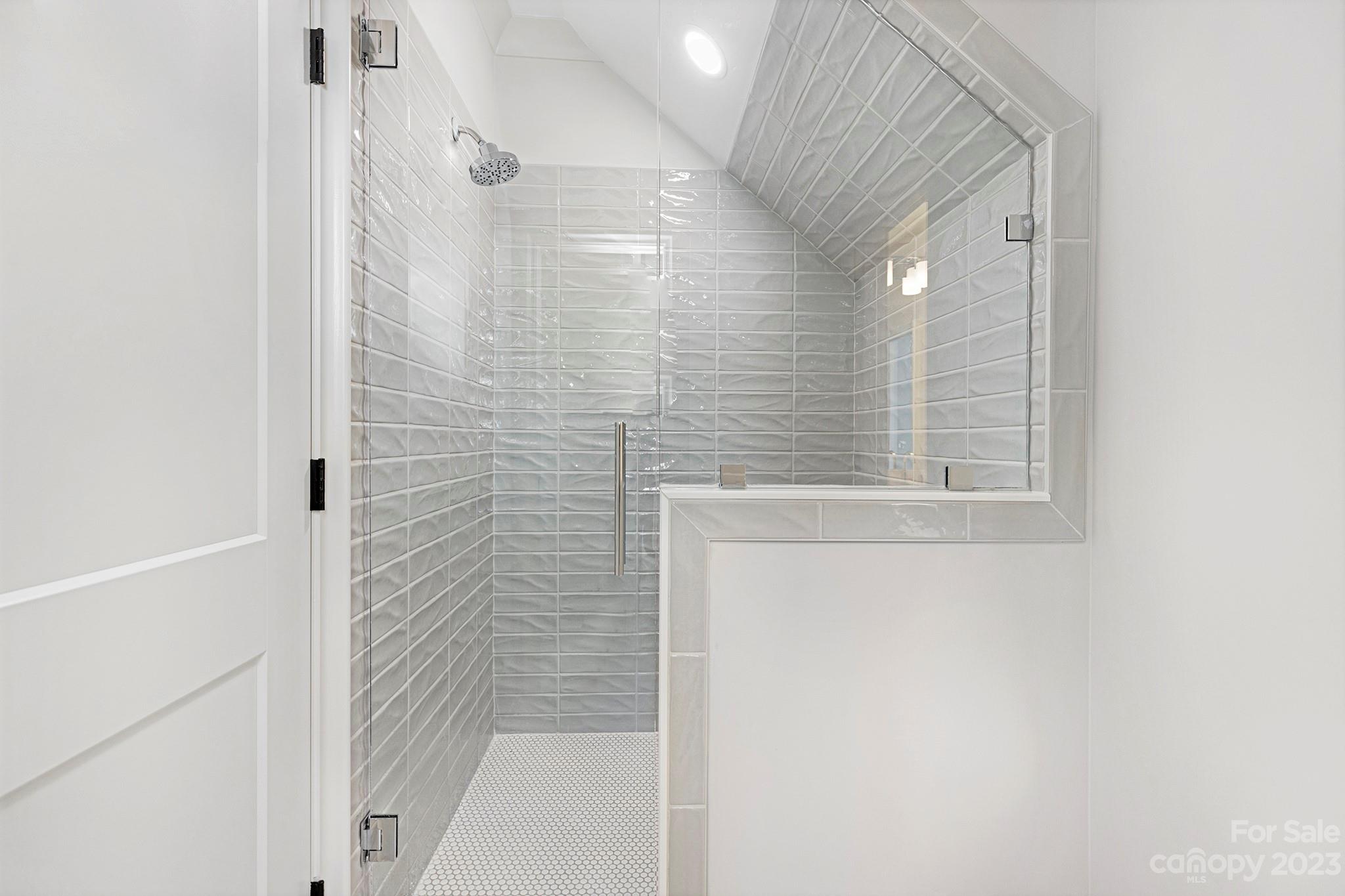 1213 Reece Road Charlotte, NC 28209 - Photo 27 of 31 a bathroom with a shower
