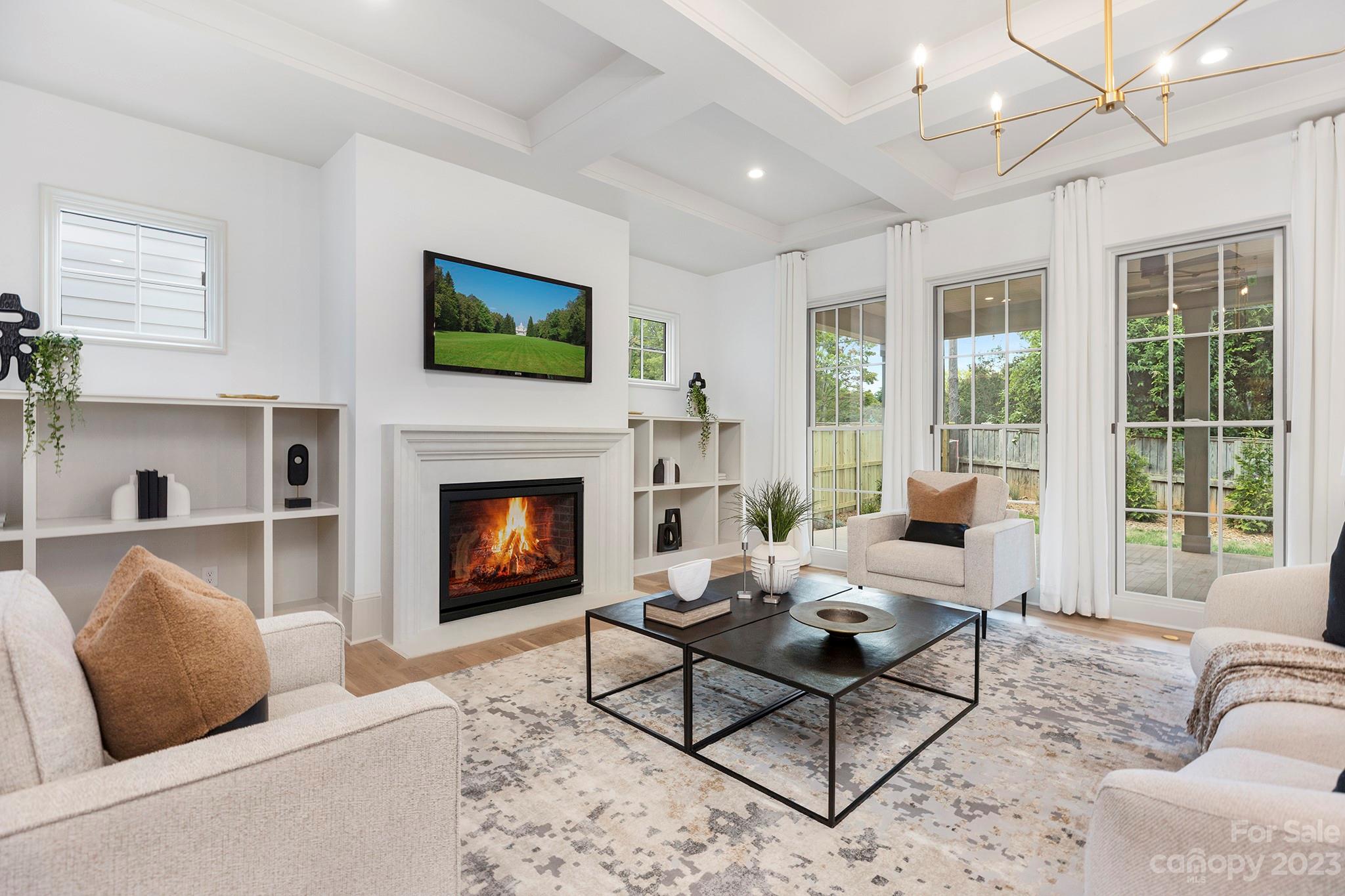 1213 Reece Road Charlotte, NC 28209 - Photo 7 of 31 a living room with furniture and a fireplace