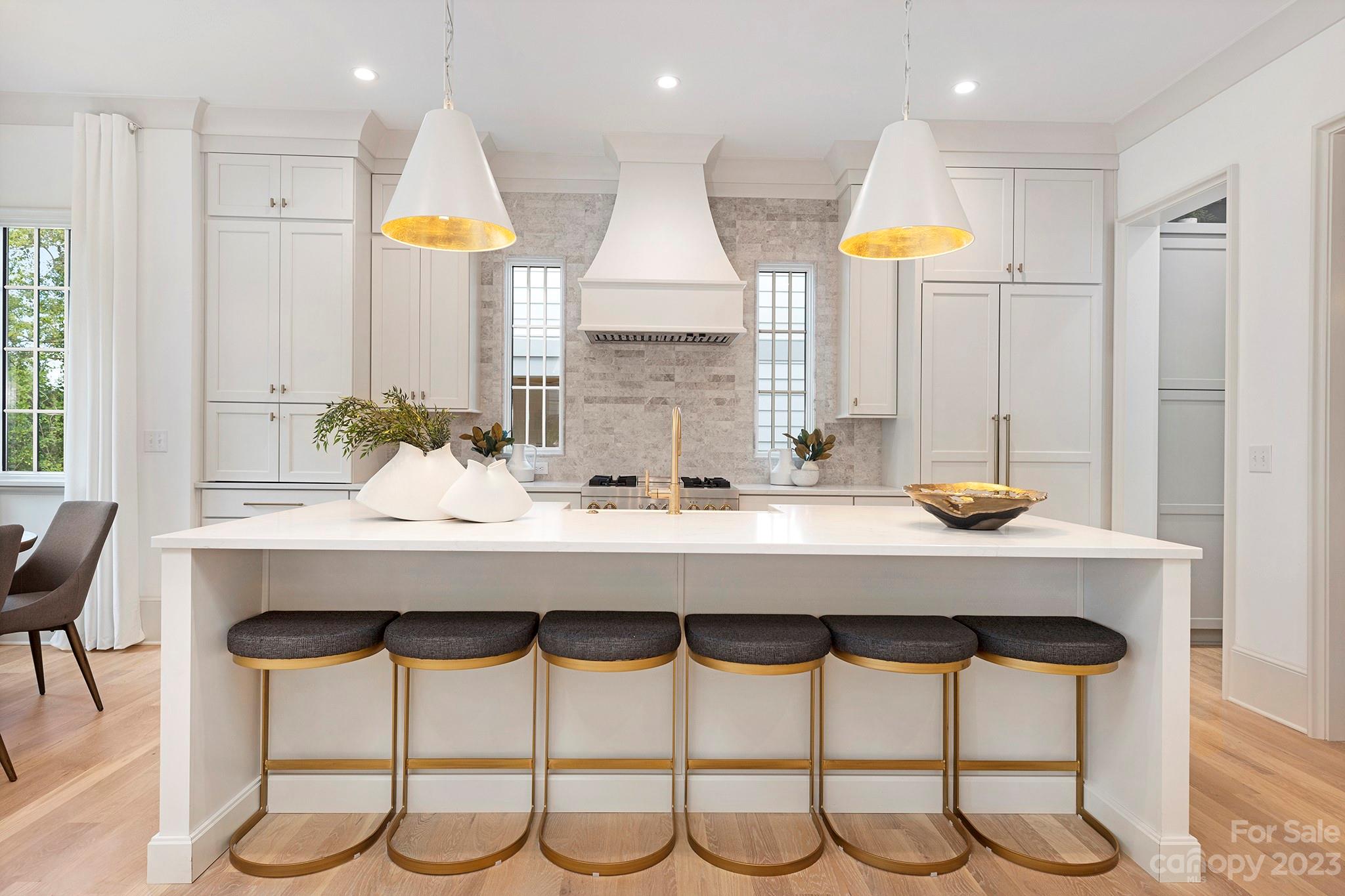 1213 Reece Road Charlotte, NC 28209 - Photo 10 of 31 a kitchen with a table and chairs in it