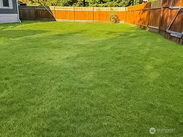 a view of an outdoor space and a yard