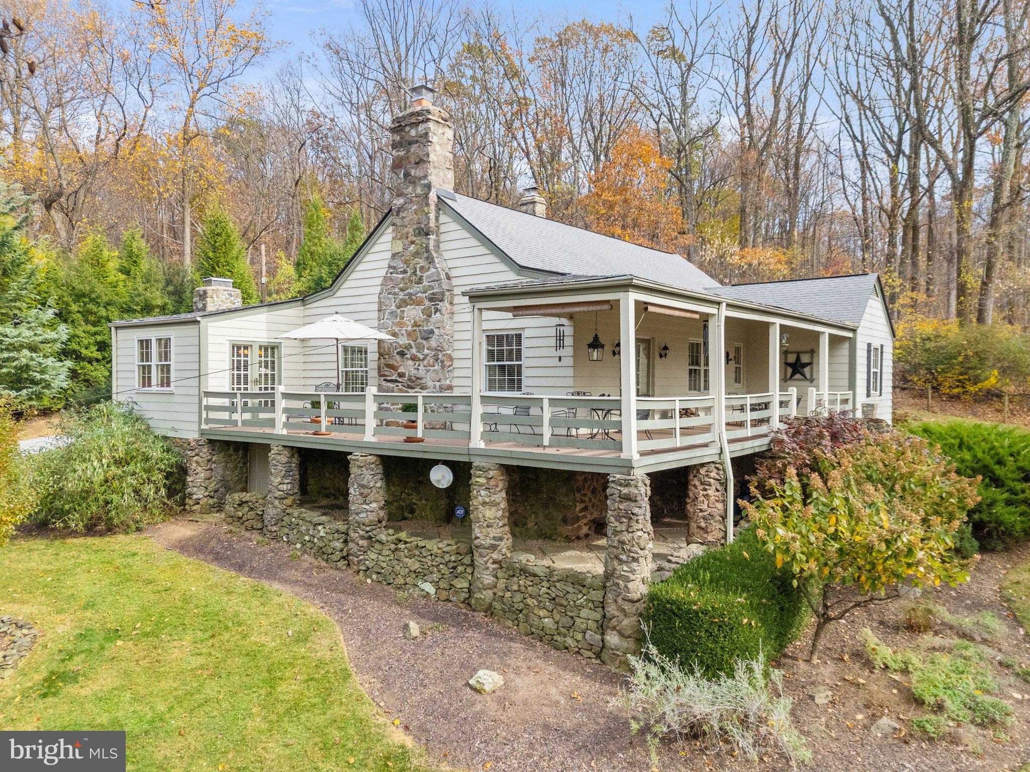 17970 Raven Rocks Road Bluemont, VA 20135 - Photo 1 of 78 a view of house with a yard and potted plants