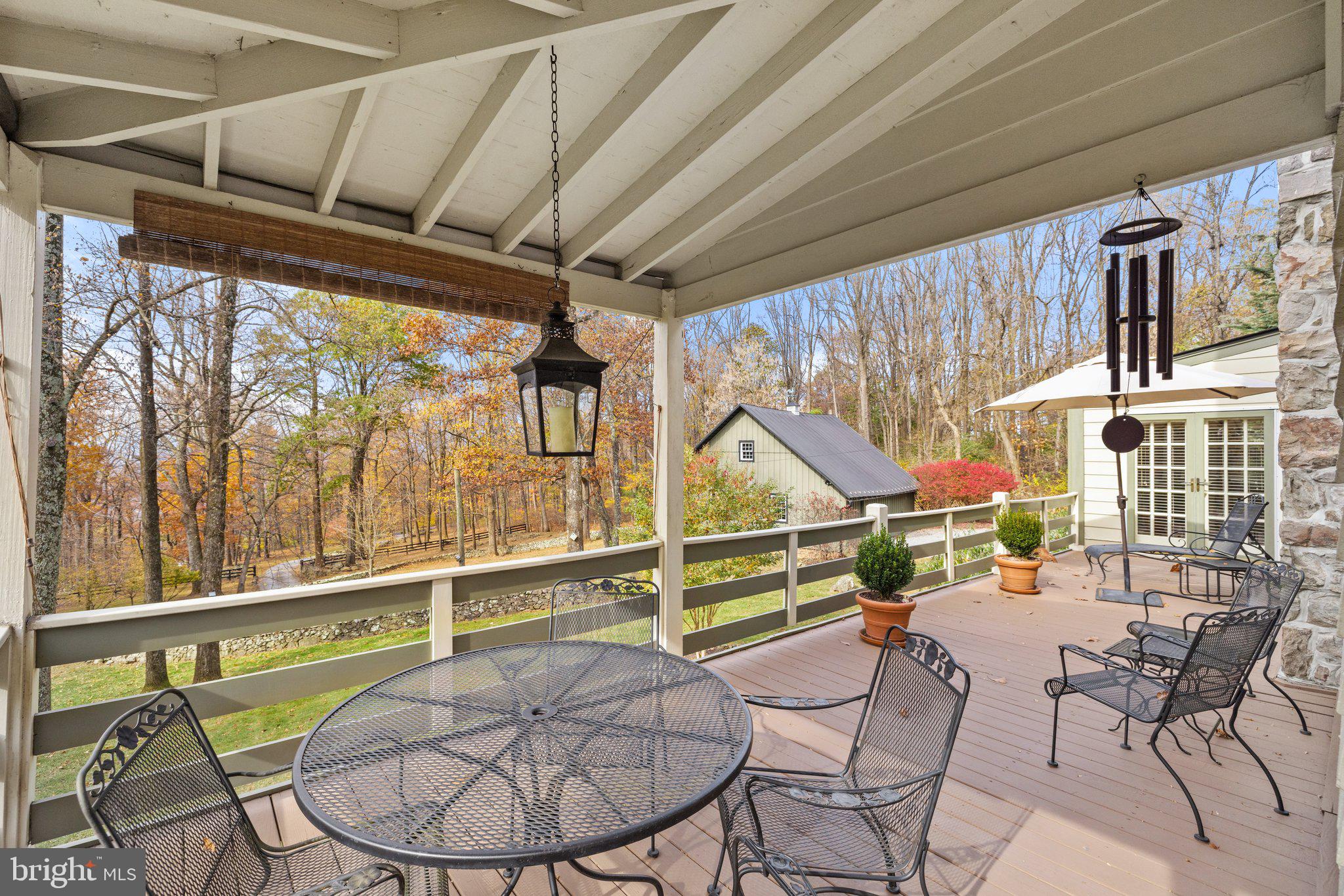 17970 Raven Rocks Road Bluemont, VA 20135 - Photo 30 of 78 a view of a chairs and table in the patio