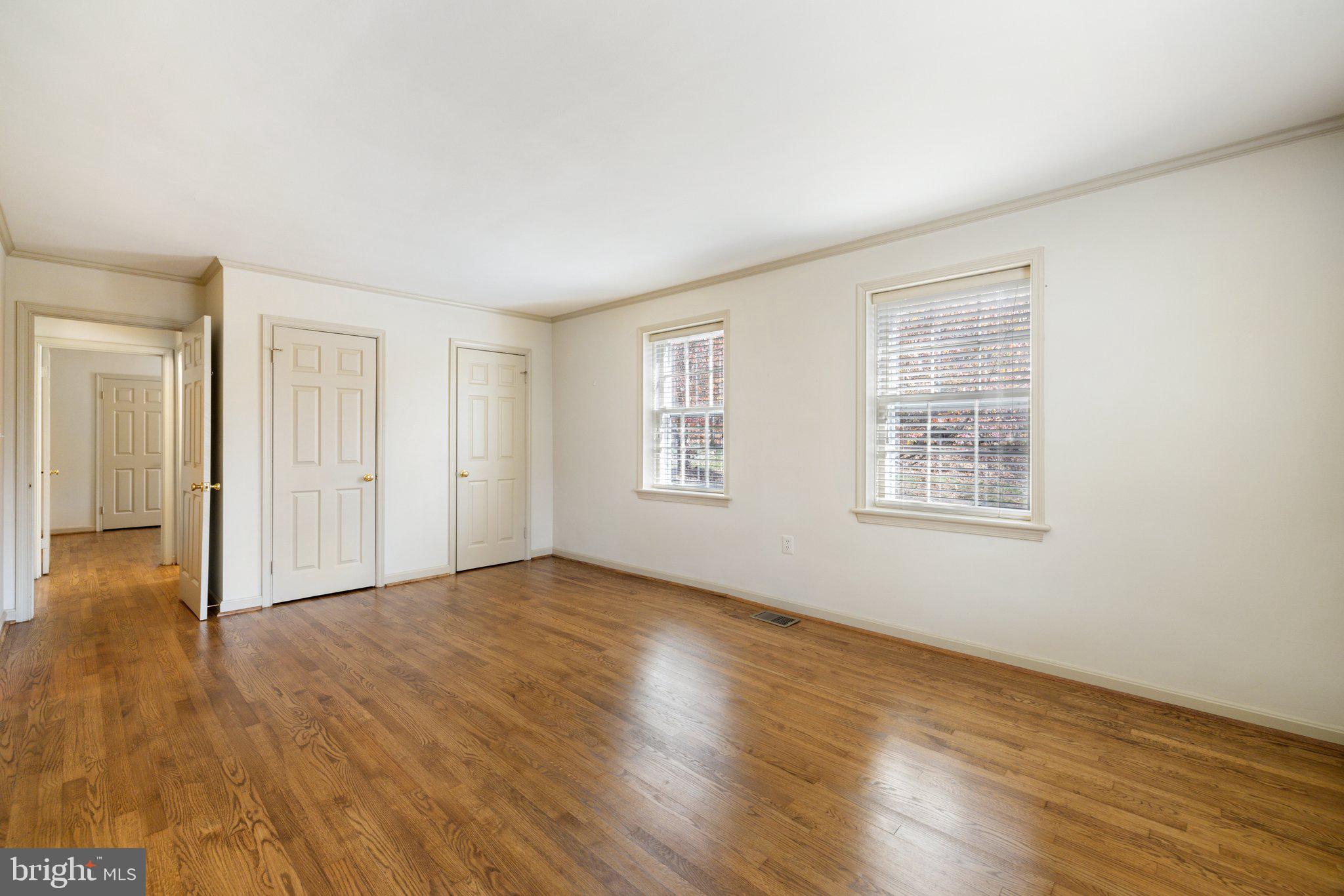 17970 Raven Rocks Road Bluemont, VA 20135 - Photo 39 of 78 a view of an empty room with wooden floor and a window