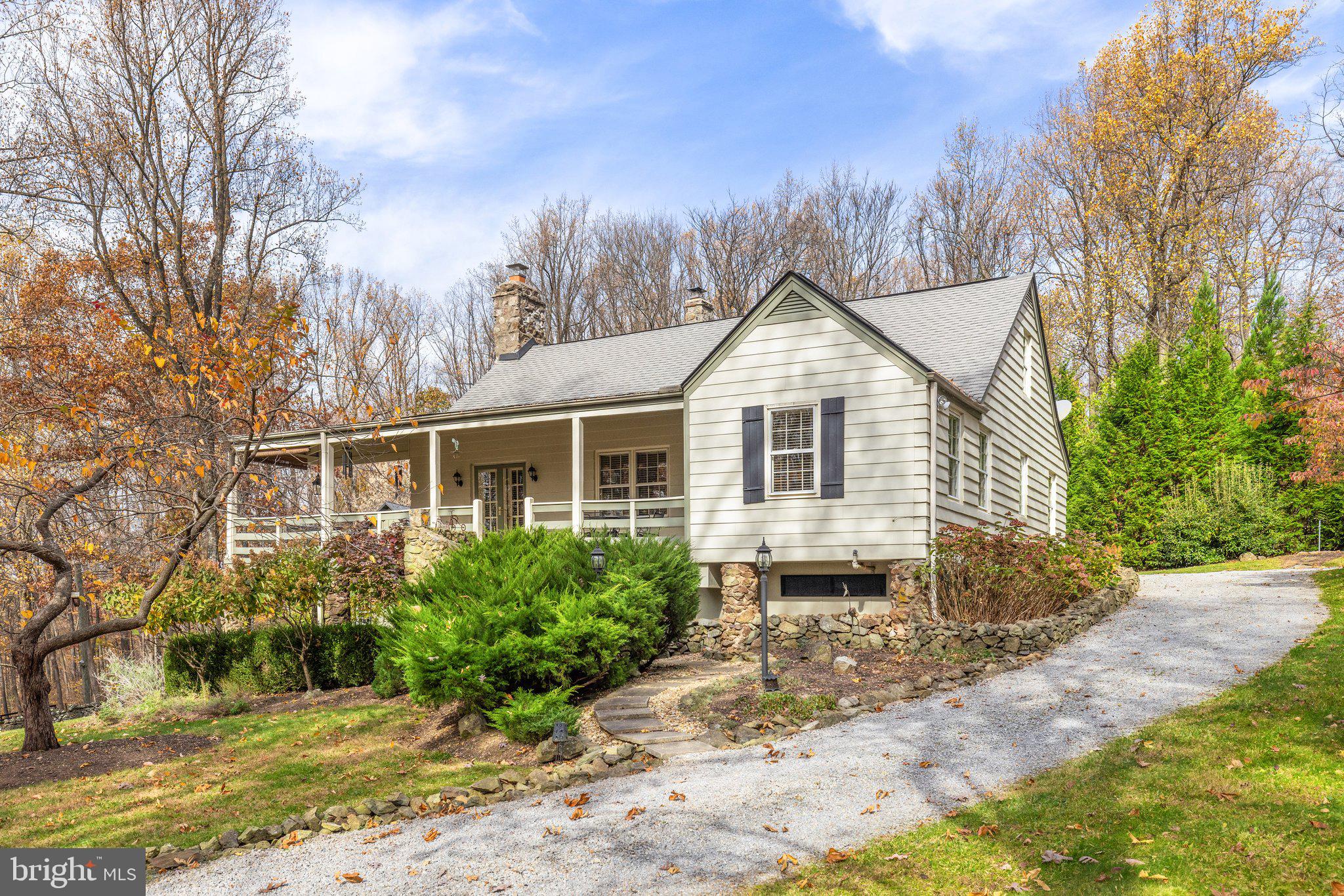 17970 Raven Rocks Road Bluemont, VA 20135 - Photo 63 of 78 a front view of a house with a yard