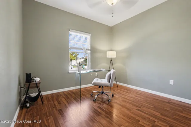 a workspace with furniture and a window