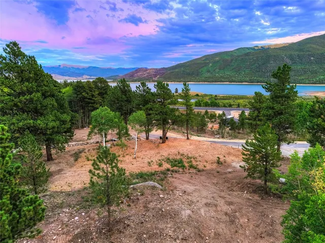 a view of a patio with a table and chairs