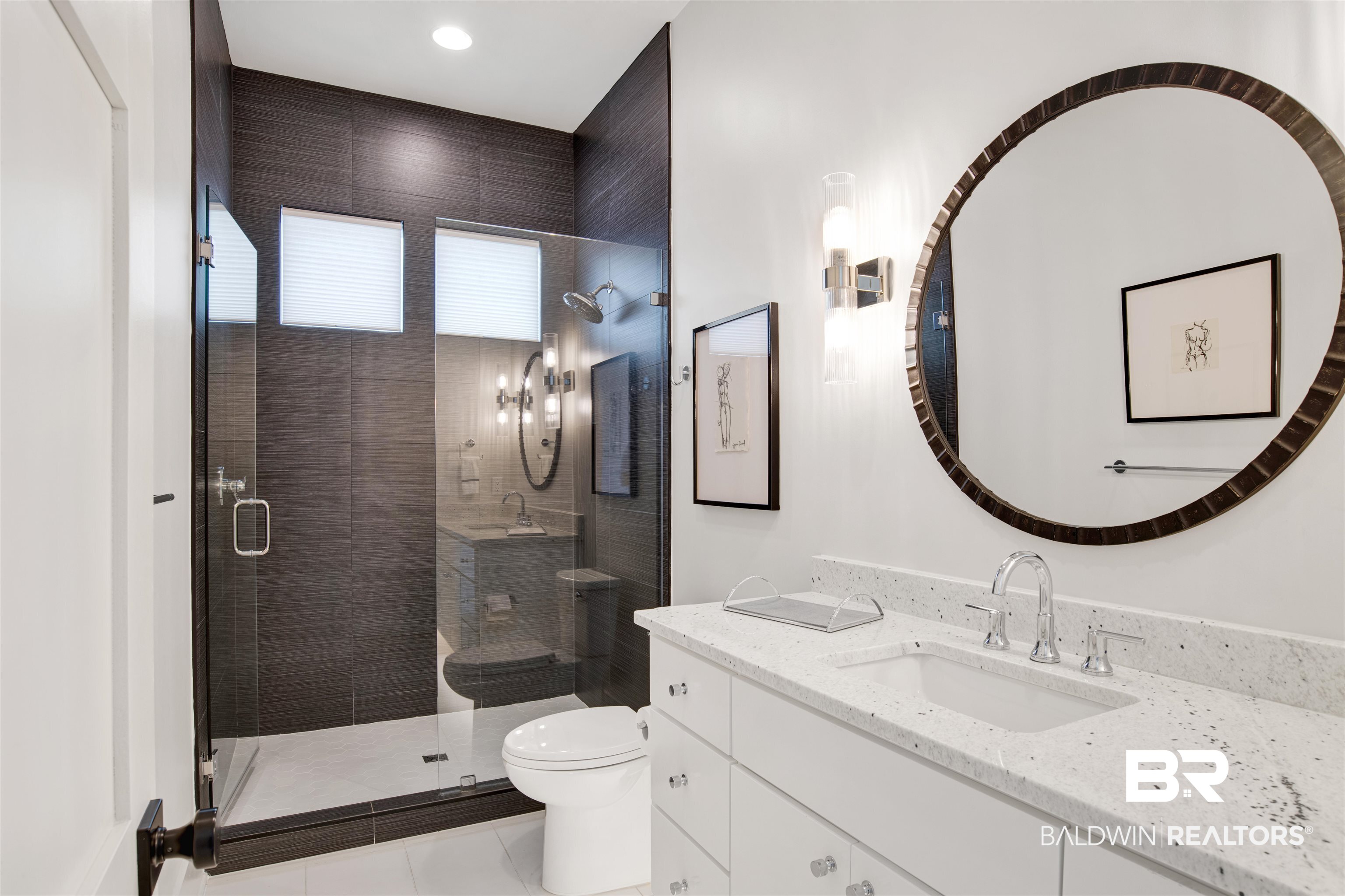 30239 Canal Court Orange Beach, AL 36561 - Photo 41 of 70 Bathroom featuring vanity, a stall shower, and light tile patterned floors