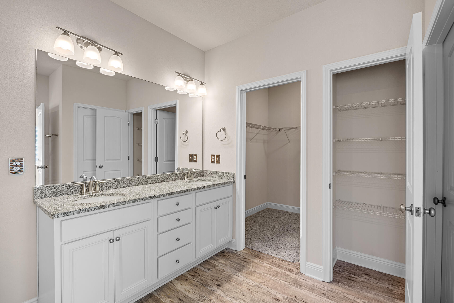 220 Conner Circle Santa Rosa Beach, FL 32459 - Photo 36 of 50 a spacious bathroom with a granite countertop sink a mirror and a shower