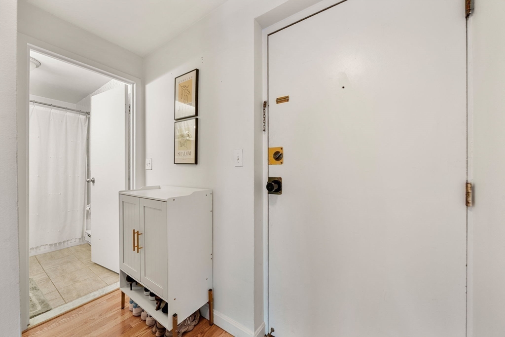 94 Beacon Street, Unit 83 Somerville, MA 02143 - Photo 15 of 22 a view of elevator with hallway