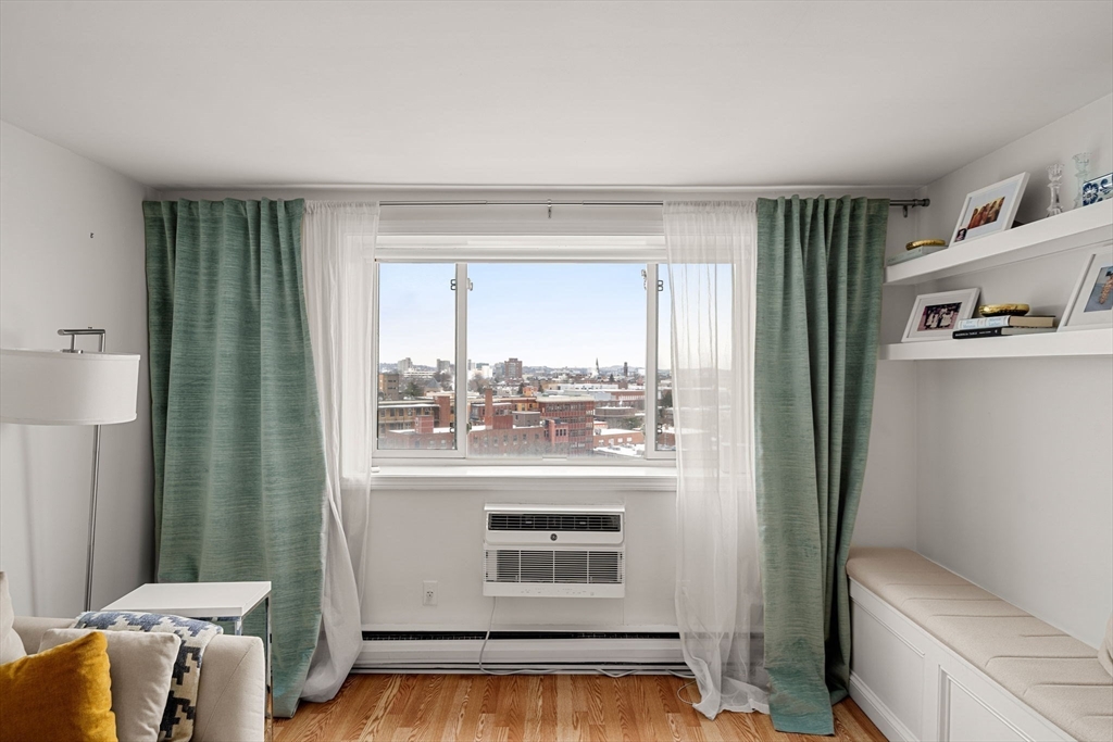 94 Beacon Street, Unit 83 Somerville, MA 02143 - Photo 3 of 22 a view of a livingroom with furniture and front door