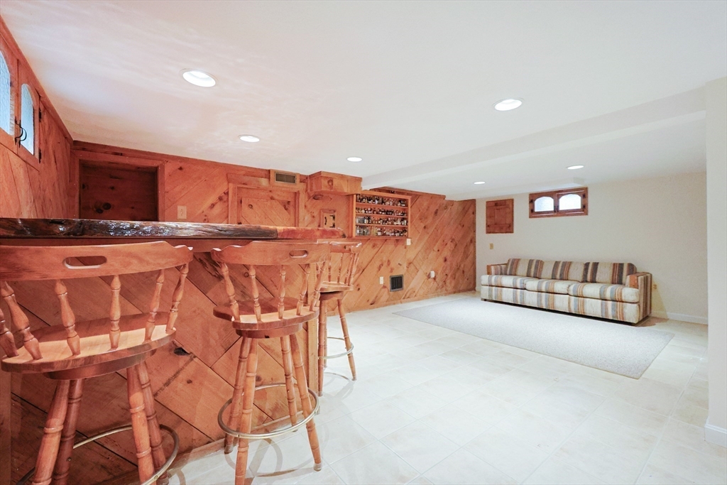 580 2nd Street Everett, MA 02149 - Photo 23 of 29 a view of a livingroom with furniture and a ceiling fan