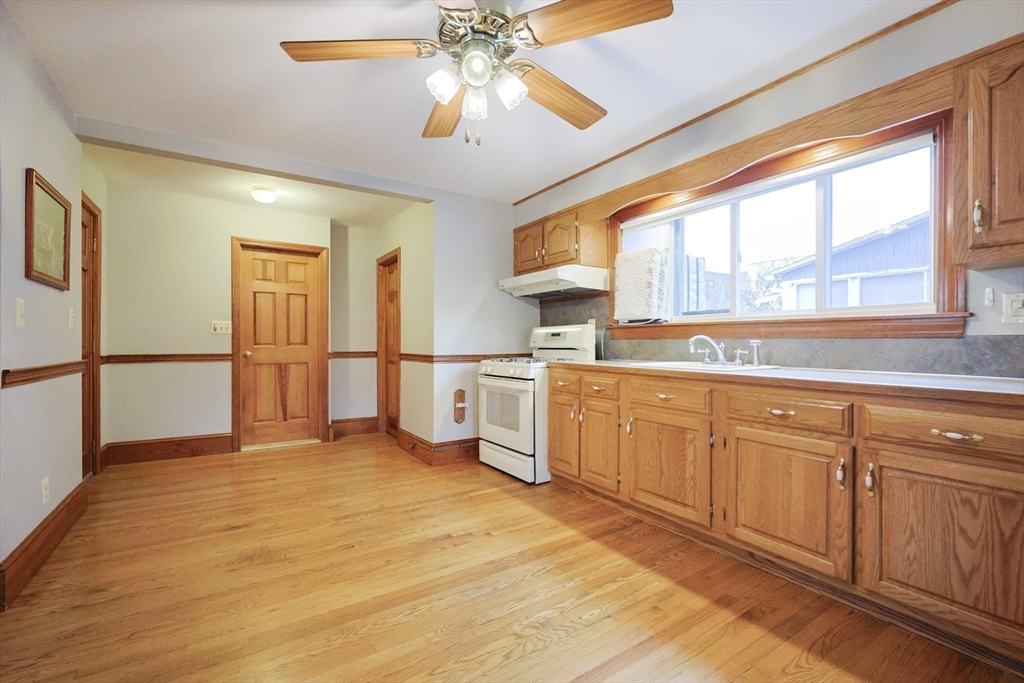 580 2nd Street Everett, MA 02149 - Photo 9 of 29 a open kitchen with cabinets a sink and appliances