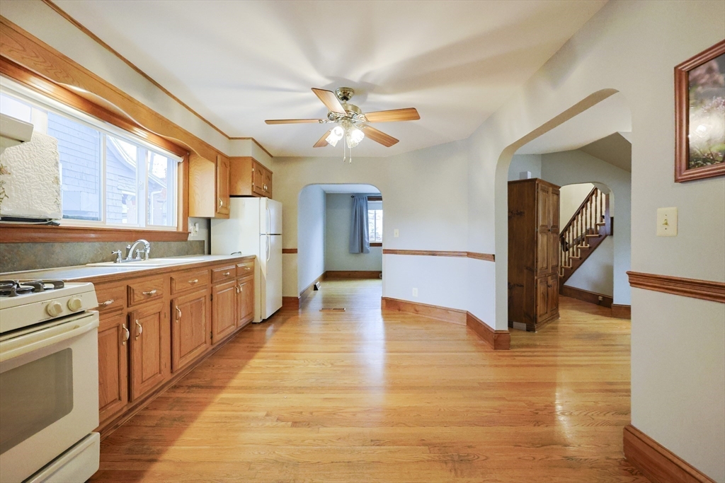 580 2nd Street Everett, MA 02149 - Photo 10 of 29 a view of a kitchen with wooden floor and a kitchen view