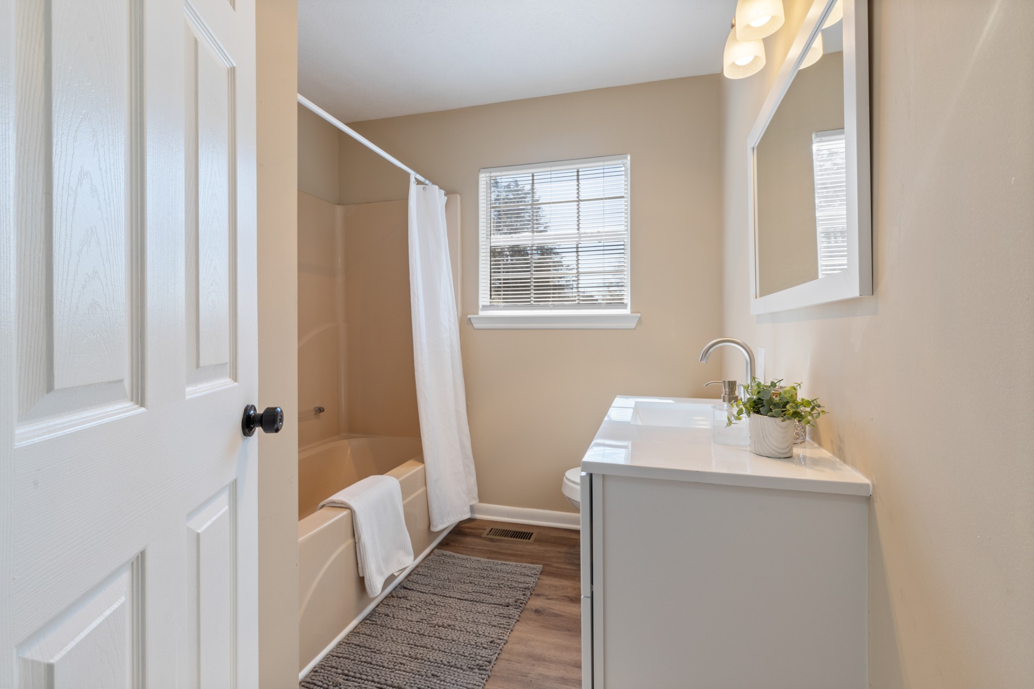 108 Aaron Drive Burns, TN 37029 - Photo 17 of 31 a bathroom with a sink and a window