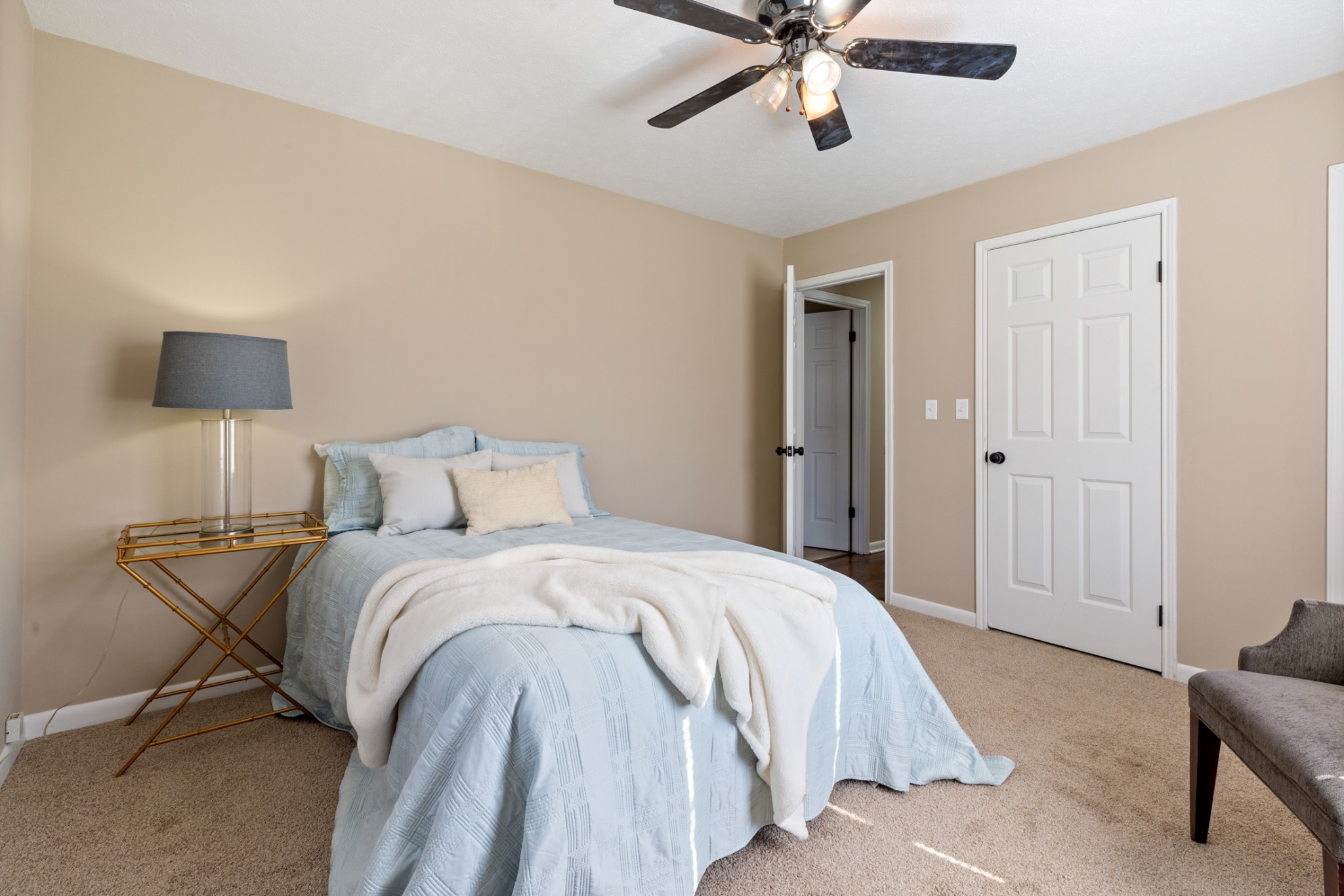 108 Aaron Drive Burns, TN 37029 - Photo 24 of 31 a bedroom with a bed and a chandelier