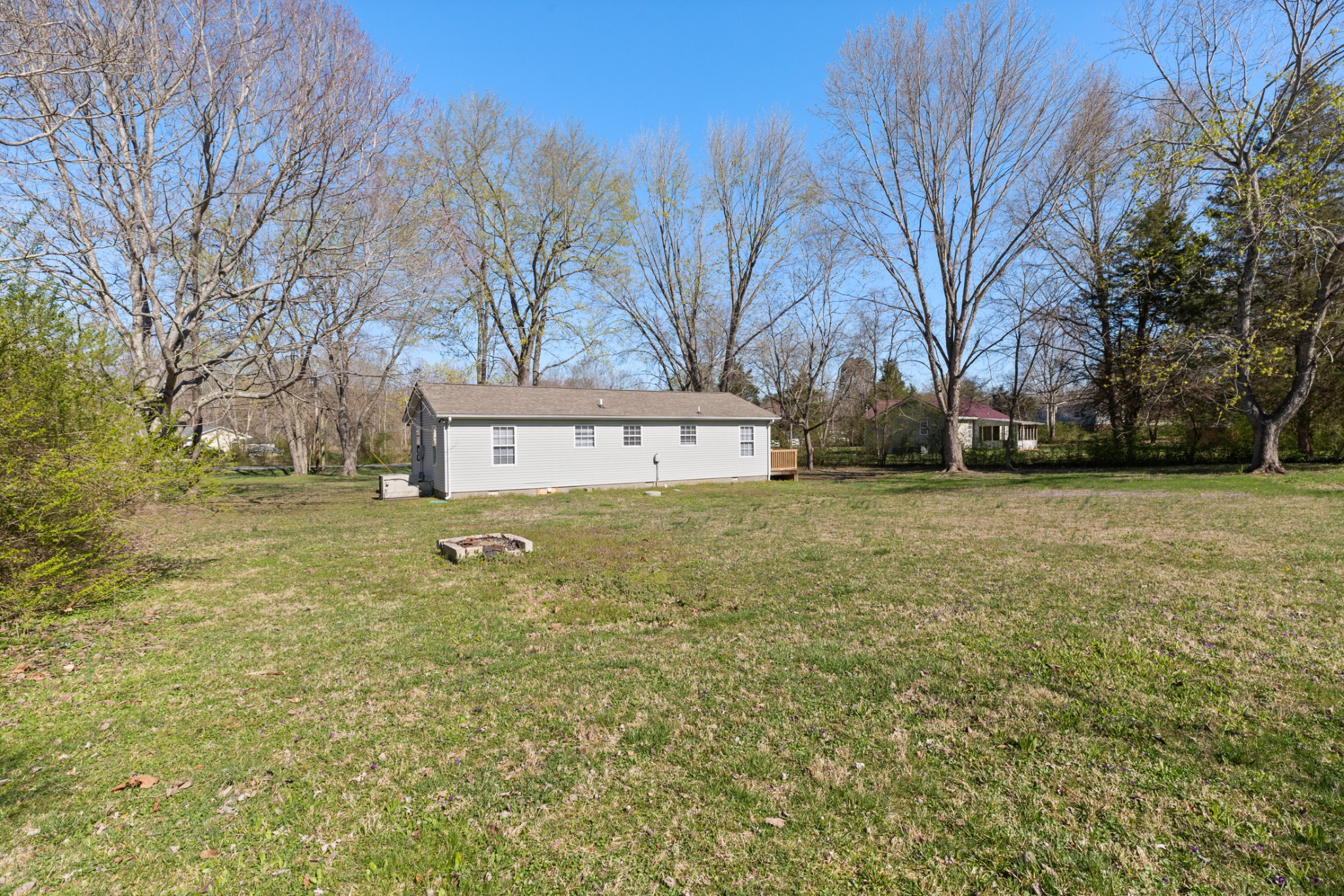 108 Aaron Drive Burns, TN 37029 - Photo 29 of 31 a view of a field with large trees