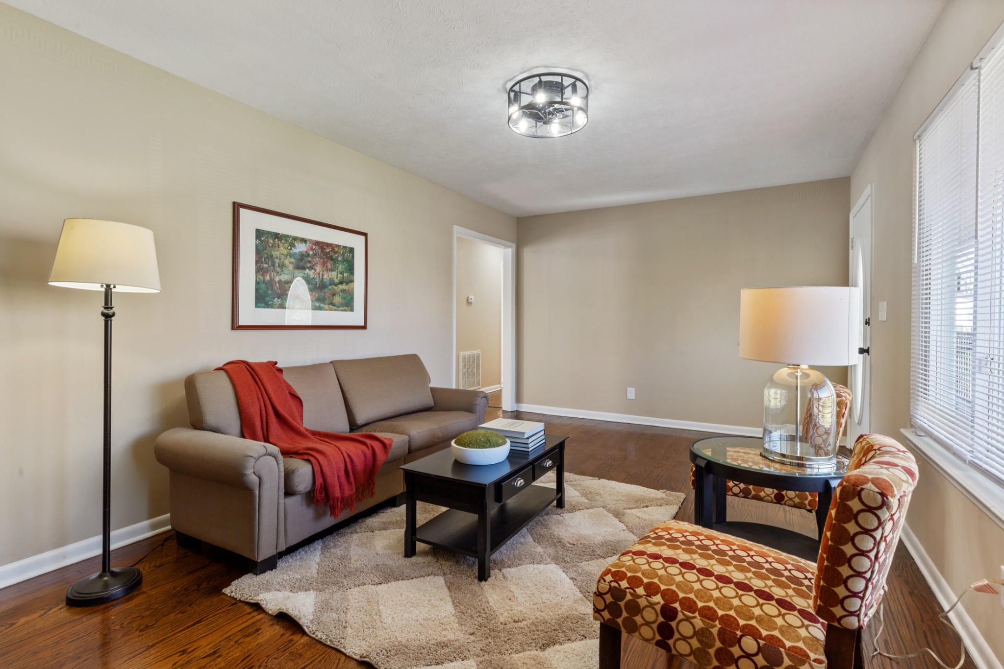 108 Aaron Drive Burns, TN 37029 - Photo 10 of 31 a living room with furniture and a lamp