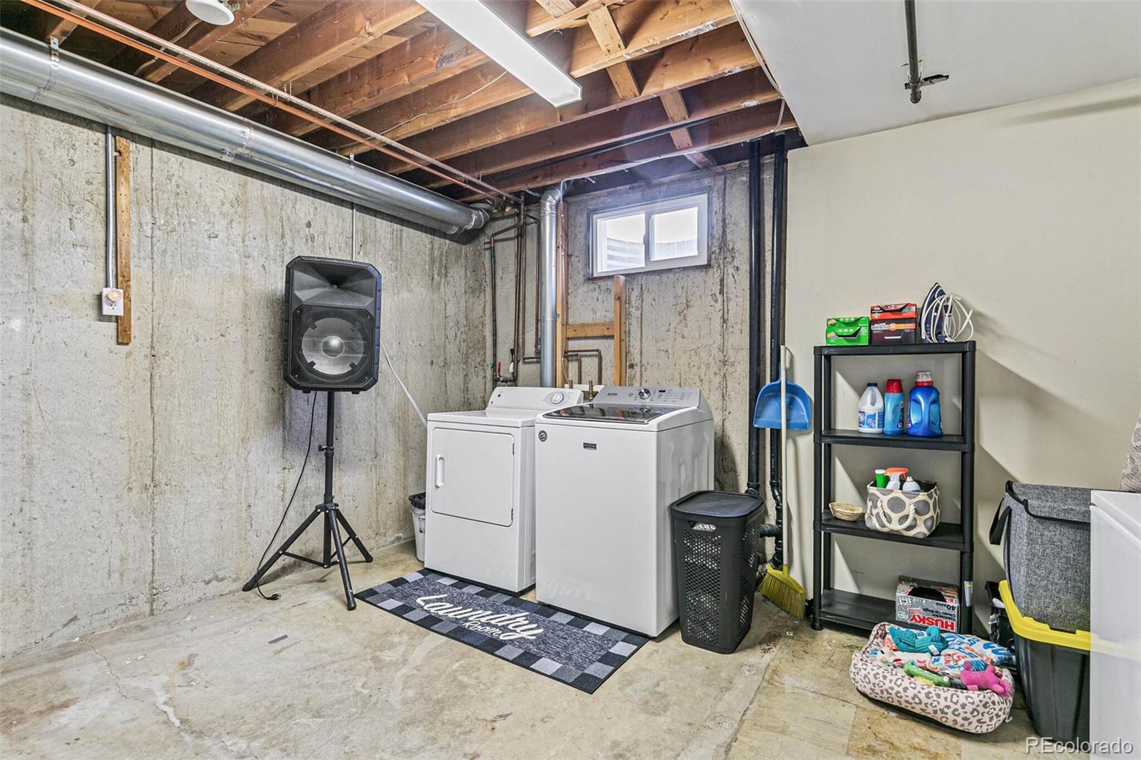 10800 Larry Drive Northglenn, CO 80233 - Photo 23 of 28 a storage room with washer and dryer