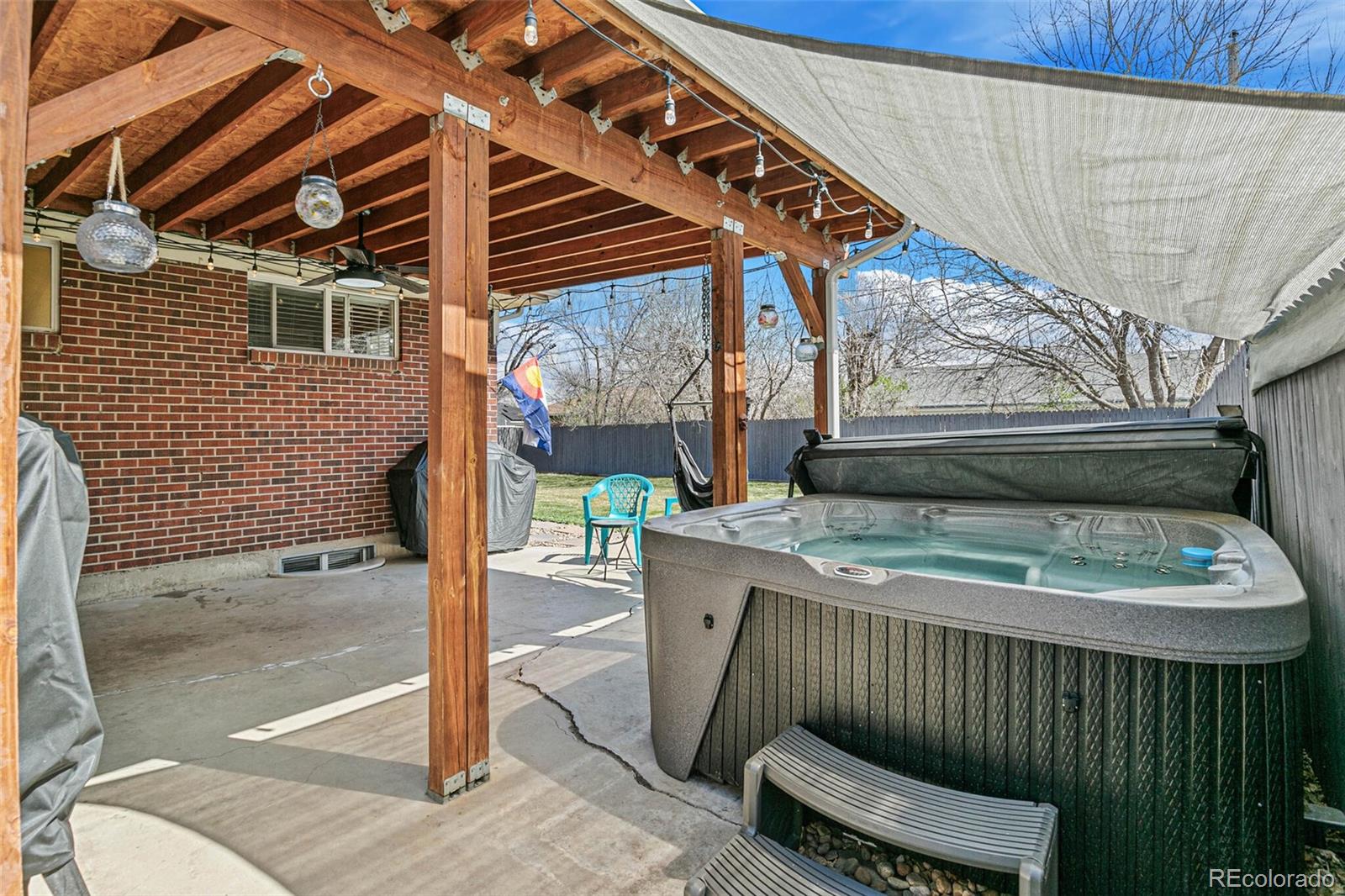 10800 Larry Drive Northglenn, CO 80233 - Photo 25 of 28 a view of outdoor space and deck