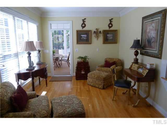 114 Lantern Ridge Lane Cary, NC 27519 - Photo 7 of 25 The keeping room is immersed in natural light and offers the perfect spot to entertain or relax and read a book. Sun Room