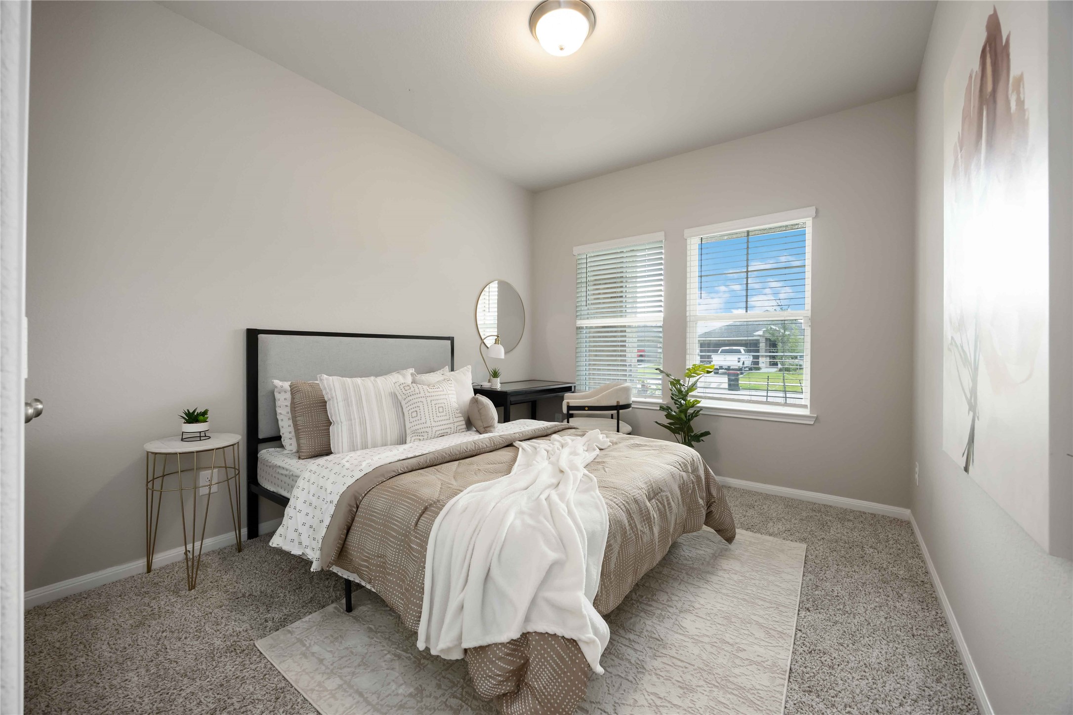 6814 Ventura Drive Rosharon, TX 77583 - Photo 9 of 30 This downstairs bedroom with a calming palette and generous windows offers a quiet and restful space.