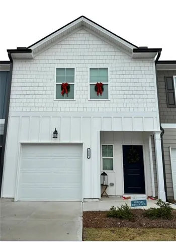 a view of a house with garage