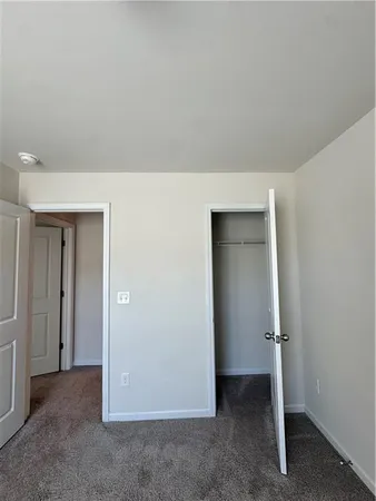 an empty room with closet